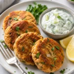 Low-sodium salmon patties with cucumber yogurt sauce