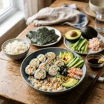 Homemade California roll with sushi rice, nori, crab, avocado and cucumber